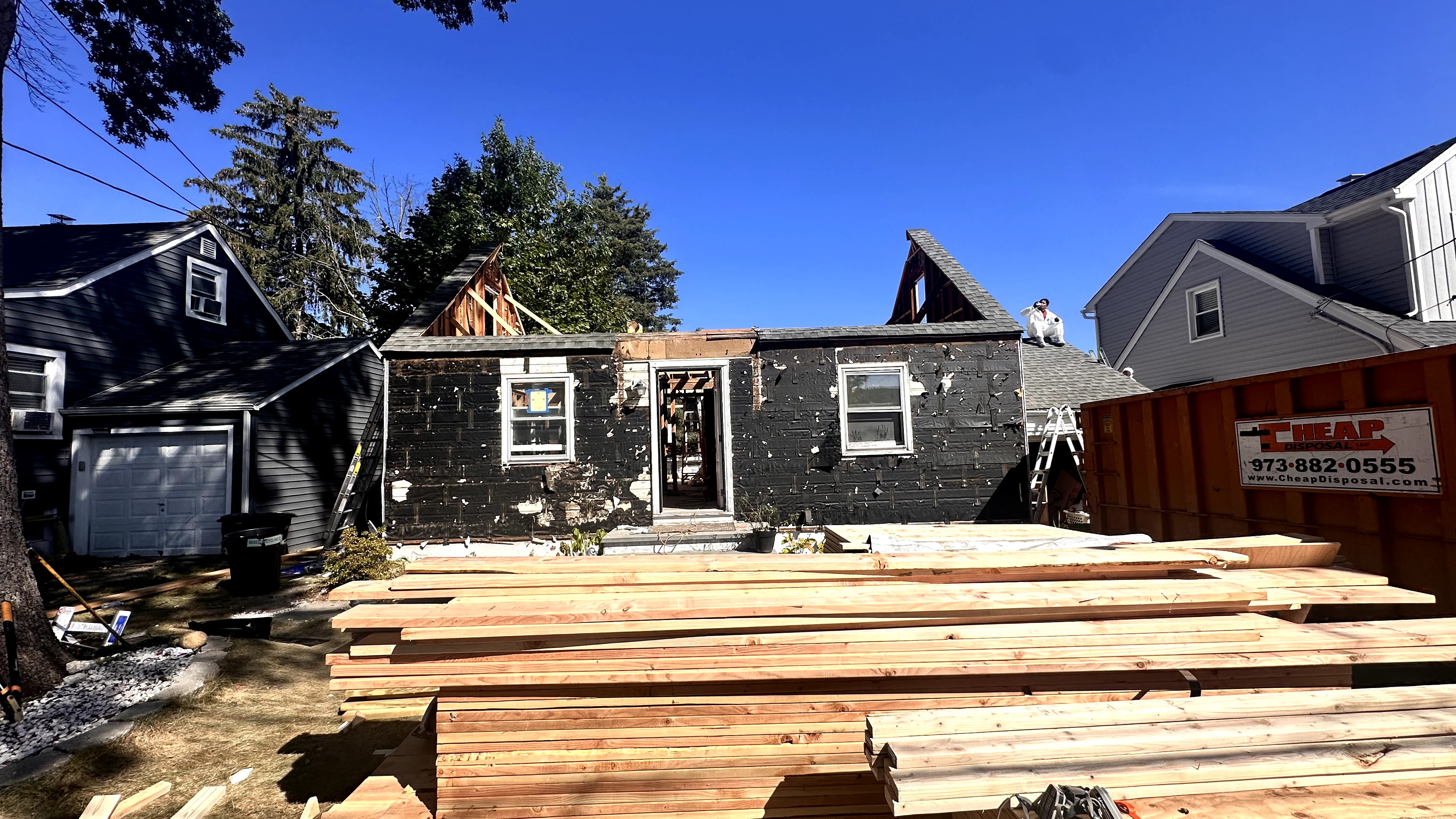 Exterior of home being renovated with siding removed