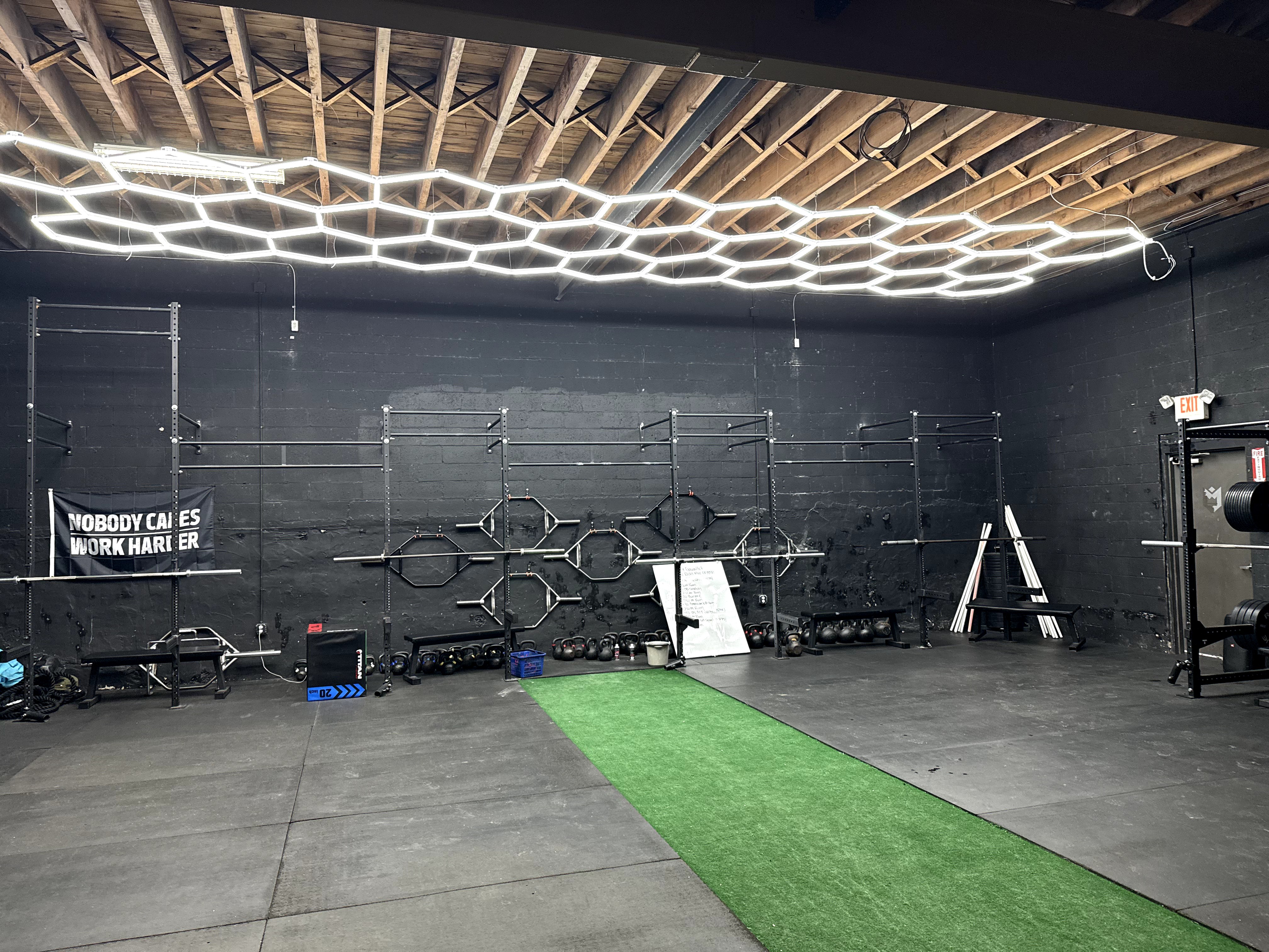 After photo of a clean and modern gym with organized equipment
