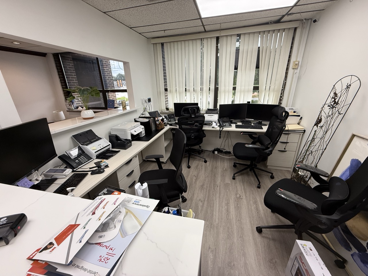 Modern office reception area with white countertop