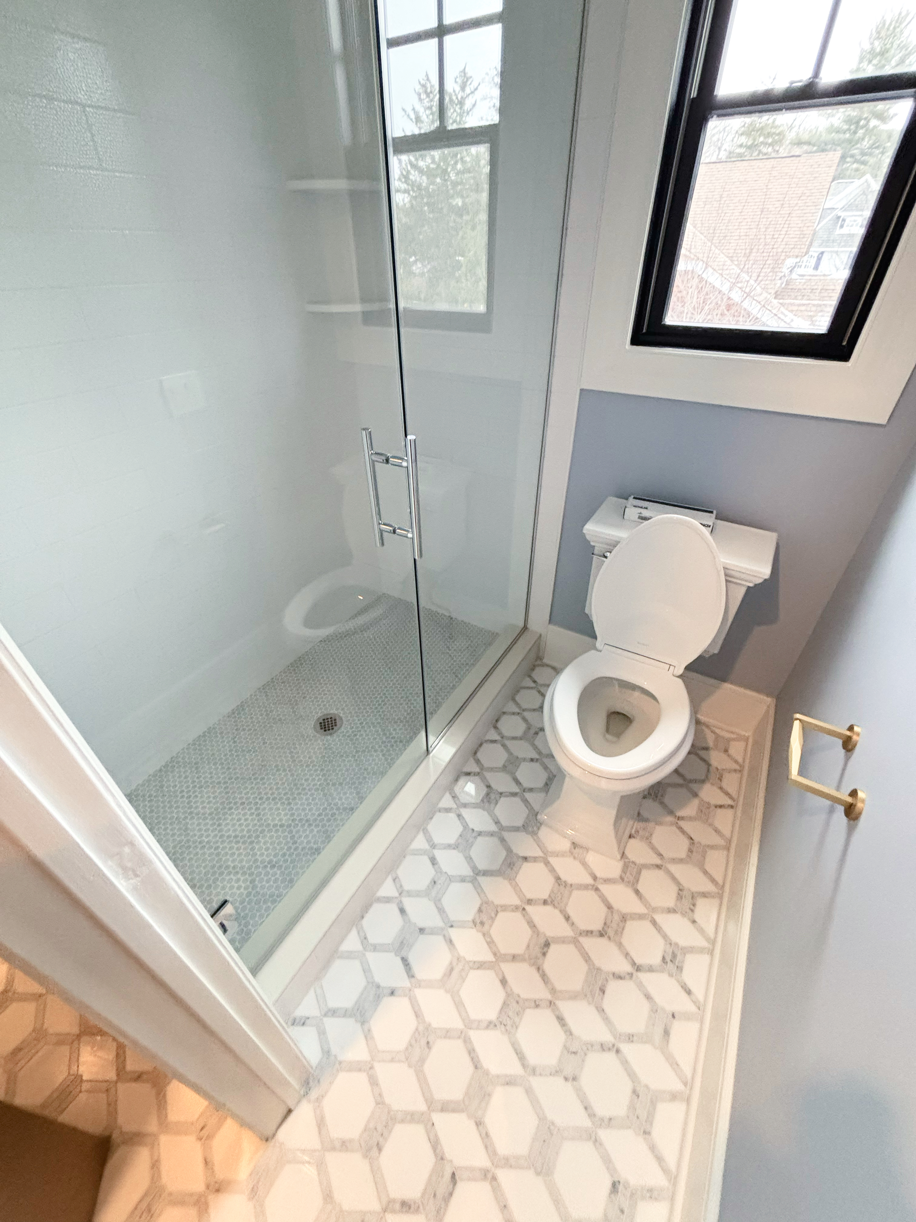 Before: Short Hills bathroom with inefficient standing shower for a family